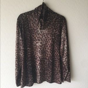 Women’s plus size animal print top.